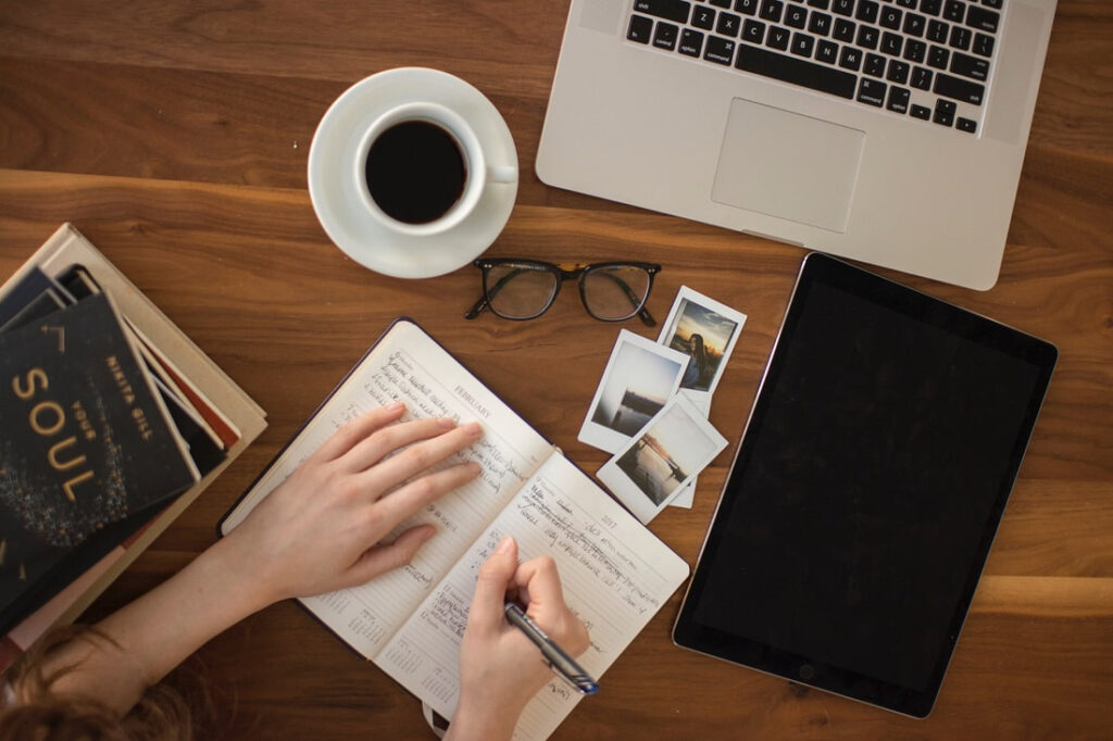 writing papers in notebook